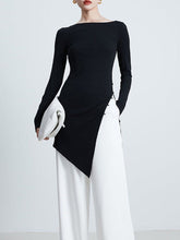 Asymmetric Black Top with White Trousers